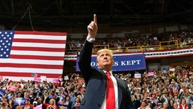 In a hard-driving series of rallies around the country, President Donald Trump has put himself at the centre of the US midterm campaign. — AFP/VNS