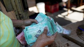 Venezuela loại đồng USD khỏi thị trường hối đoái