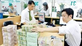 Không để bị động trong điều hành chính sách tiền tệ