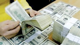 Việt Nam lọt top 10 nước tiếp nhận lượng kiều hối lớn nhất thế giới (Ảnh minh họa: KT)