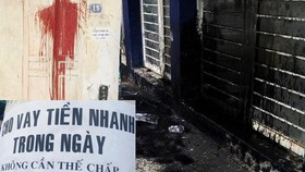 Nhà người dân bị các đối tượng "xã hội đen", cho vay nặng lãi khủng bố bằng sơn, dầu nhớt, mắm tôm...