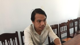 Cao Hoàng Long tại cơ quan công an