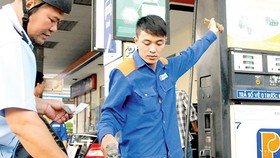 Giá xăng giảm 1.082 đồng/lít