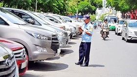 Car owners will pay parking charges for nearly 23 roads in Ho Chi Minh City, starting on August 1.