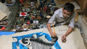 Photo exhibition honors Hanoi’s traditional crafts
