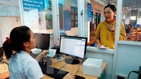 Health care facilities are required to apply electronic health care record before 2028. (Photo: VNA)