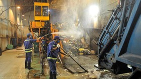 Household refuse is treated in the HCMC Urban Environment Company Limited. Photo by Cao Thang