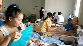 Increase in cases of encephalitis due to measles, flu complications