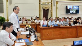 HCMC Party Chief Nguyen Thien Nhan delivered his speech at the meeting. Photo by Viet Dung