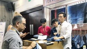 A booth at the Denims and jeans Vietnam exhibition. The denim production sector has high growth potential and is seeing more and more investors, experts say. - VNA Photo My Phương