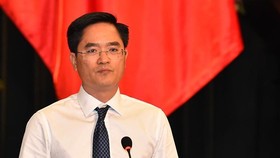 Director of the municipal Department of Transport Tran Quang Lam at the question-and-answer session (Photo: SGGP)