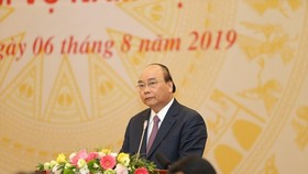 PM Phuc speaks at the teleconference (Photo: SGGP)