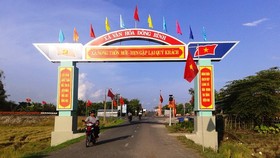 The path leads to Dong BInh Commune in Can Tho City ( Photo: SGGP)