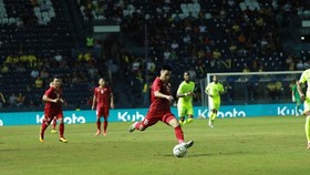 Midfielder Duc Huy (No. 15) equalised for Vietnam at the 83rd minute (Photo: VNA)