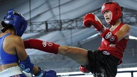 Fighter Bui Yen Ly (right) (Source: vnexpress)