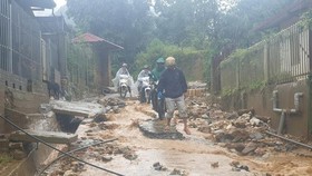 Heavy downpours trigger soil and rock downslope