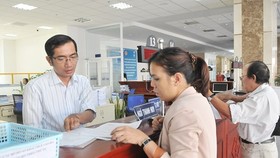 Đăng ký thuế tại Cục Thuế TPHCM. Ảnh: CAO THĂNG