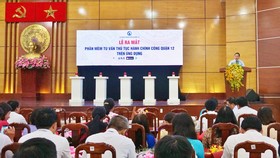 Ông Trần Hữu Trí - Bí thư Quận ủy, Chủ tịch HĐND quận phát biểu tại Lễ ra mắt ứng dụng IURA. Ảnh: TTĐTQ12