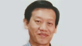 Police on Saturday issued an international wanted notice for Le Nguyen Hung, a fugitive bank executive for fraudulence, illegally appropriating over US$10 million from a customer. (Photo: tuoitre.vn)