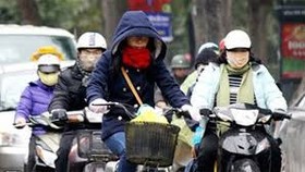 Cold front slams into northern region, rendering rain
