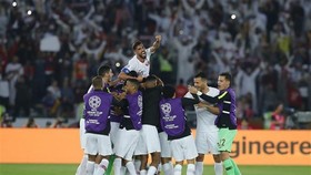 Qatari players celebrate their victory (Photo: Xinhua/VNA)