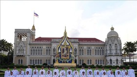 New cabinet members of Thailand led by Prime Minister Prayut Chan-o-cha have been sworn in on July 16. (Photo: AFP/VNA)