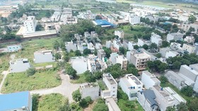 Tan Nhut commune Residential area and Mall. (Photo: SGGP)