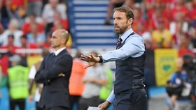 HLV Gareth Southgate và đồng nghiệp Roberto Martinez xem ra chưa thể có lần đấu trí sòng phẳng với nhau. Ảnh: Getty Images
