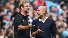 HLV Jurgen Klopp và Pep Guardiola sẽ tái lập màn “đấu tay đôi”? Ảnh: Getty Images