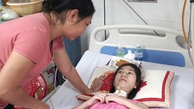 Sự sống mong manh của cô gái teo cơ tủy sống