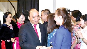 Thủ tướng Nguyễn Xuân Phúc và phu nhân gặp gỡ cộng đồng người Việt Nam tại Na Uy. Ảnh:TTXVN