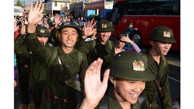 Cần quy định rõ nam giới một mình nuôi con nhỏ được miễn nghĩa vụ dân quân