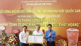 Lễ công bố quyết định công nhận bảo vật Quốc gia. Ảnh: TTXVN