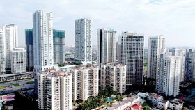 Sự phổ biến của chung cư đòi hỏi cần có sự chuyên nghiệp trong quản lý, điều hành Ảnh: THÀNH TRÍ