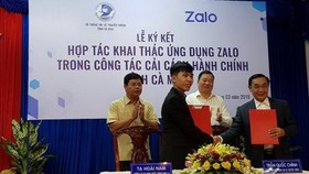 Lễ ký kết hợp tác khai thác ứng dụng Zalo - Ảnh: Hàm Yên