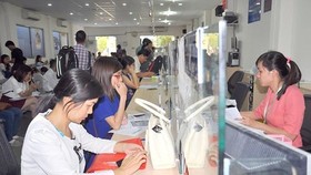 Tiếp nhận hồ sơ của cá nhân và doanh nghiệp tại Phòng Đăng ký kinh doanh Sở KH-ĐT. Ảnh minh họa