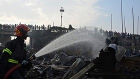 Hiện trường vụ hỏa hoạn. Ảnh: Reuters