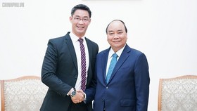 Thủ tướng Nguyễn Xuân Phúc và chuyên gia kinh tế Philipp Rosler - Ảnh: VGP/Quang Hiếu