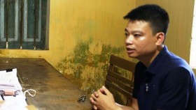 Đối tượng Doãn Thanh Bình tại cơ quan công an