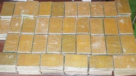 Bắt vụ vận chuyển 100 bánh heroin trên quốc lộ 6A