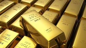 Giá vàng thế giới đi lên trong khi chứng khoán toàn cầu sụt giảm