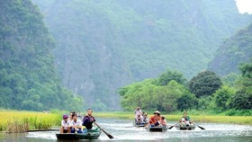 Vẻ đẹp hài hòa của trời, đất, núi, sông ở Tràng An tạo nên một thế giới tự nhiên sống động đầy quyến rũ. (Ảnh: Minh Đức/TTXVN)