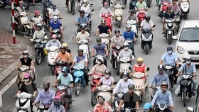 Xe máy sẽ buộc phải dừng hoạt động tại các quận của Hà Nội vào năm 2030. (Ảnh: Doãn Đức/Vietnam+)