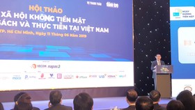 Phó Thủ tướng Vương Đình Huệ phát biểu tại hội thảo "Xã hội không tiền mặt: Chính sách và thực tiễn tại Việt Nam".