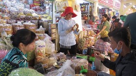 Quận huyện được ban hành giá sử dụng diện tích tại chợ