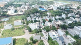 Một góc Khu Dân cư - Trung tâm thương mại xã Tân Nhựt. Ảnh: CAO THĂNG