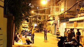 Công an khám nghiệm một vụ án trước đó. Ảnh: C.T
