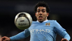 Two-goal Tevez back to haunt United