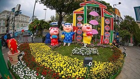 A family of pigs which are chosen as the sacred animals of Nguyen Hue Flower Street 2019