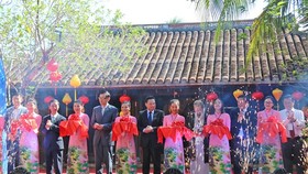 At a ribbon cutting ceremony